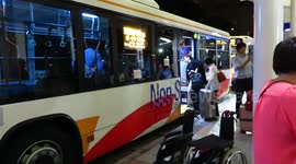 Stranded passengers board shuttle out of Kansai Airport island after hours-long wait