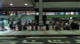 Hours-long wait for stranded passengers and airport employees queueing for shuttle bus out of Kansai Airport island