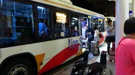 Stranded passengers board shuttle out of Kansai Airport island after hours-long wait