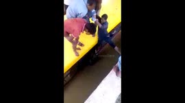 Heart-stopping moment school children are rescued from submerged bus in India