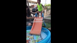 Child Fail - Child stands on slide and slips down