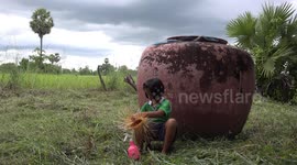 Basket weaver in rural Thailand.