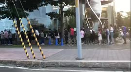 Scores queue up after Japanese mobile carrier offers free cell-phone charging in Hokkaido following quake