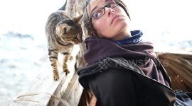 Cat Cuddling with a Cute Girl