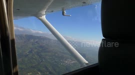 View from inside a flying small airplane