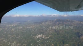 View from inside a flying small airplane_3