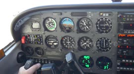 Cockpit and pilot on a flying small airplane_2