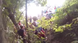 Marathon runners dodge freight train