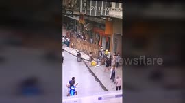 Three pedestrians get buried in huge billboard collapse in southern China