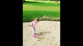 4 Year old shows how to get out a bunker at golf