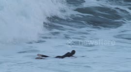 surfer get worked by wave