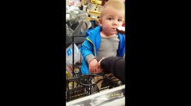 Babby boy tasting ice cream