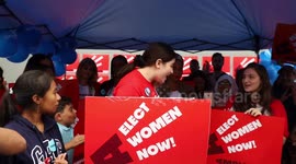 Alexandria Ocasio-Cortez takes the stage at rally for women candidates