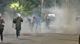Greek riot police fire tear gas at protesters during Thessaloniki International Fair