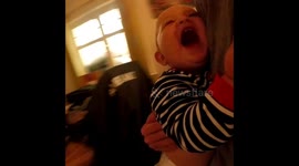 Baby loves spinning on kitchen bar stool.