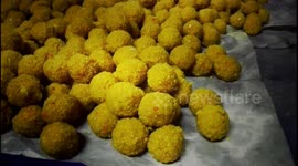 offering laddu for lord Ganesh at Kamaladi