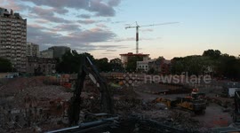 Magnificent drone footage of construction site in Downtown Montreal to a setting sun
