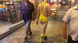 Man walks through Benidorm town centre with strange attire