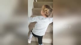 Toddler climbs stairs for first time after life-changing surgery