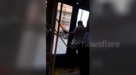 Chinese senior knocks head on bus doors after driver refused to open them