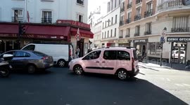 The most famous Taxi in Paris. Monique and her pink taxi cab. ( Boulevard Richard-Lenoir, Paris, France)