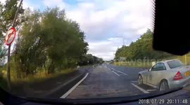 Driver overtakes without checking for on coming traffic
