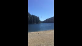 Helicopter picks up water to fight 154-acre Irving Fire