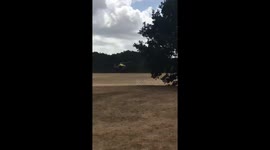 Helicopter landing on playing fields by Ferndown Leisure Centre
