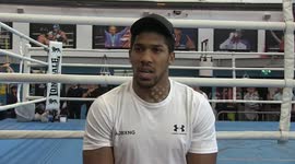 Anthony Joshua says he is happy to fight Deontay Wilder or Tyson Fury