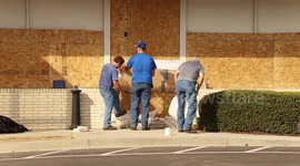Store windows boarded up in N. Carolina in anticipation of Hurricane Florence