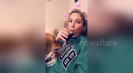 Newsflare Edit - Puppy tries to steal owner's wine