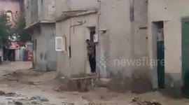 Flood dragges poor man and almost got killed