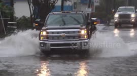 Drivers brave floods in Wilmington, North Carolina