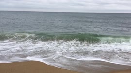 waves on a sandy beach