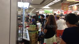 Locals do last-minute supermarket shopping as Super Typhoon Mangkhut nears Hong Kong