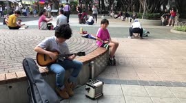 Eleven-year-old ukulele whizz kid amazes onlookers with virtuoso performance