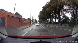 Ford Mondeo mounts curb in Staffordshire police chase