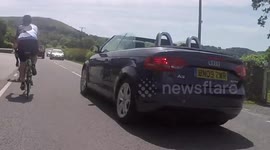 Audi driver nearly hits cyclists, forces oncoming cars to swerve. Admitted charge of Driving without Due Care and Attention.