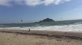 Kite surfers harness the wind from ex hurricane Helene