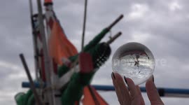 Crystal ball photography on the beach.