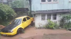 Typhoon Mangkhut leaves cars damaged, bashed into walls