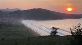Blind professor teaches young people how to surf in northern Spain
