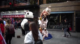Street performer illusion in Leicester Square London