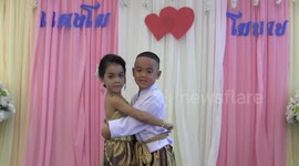 Five-year-old Thai twins marry in bizarre local ceremony