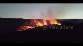 Drone footage shows volcano erupting on Reunion island