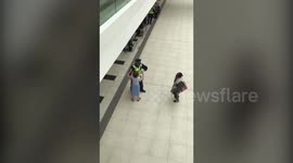 Heartwarming moment Police Community Support Officer dances with an elderly lady