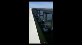 Man's office is at the base of a bridge