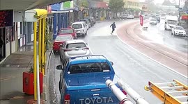 Pet owner sprints across road after dog she thought she tied to Coca-Cola flag