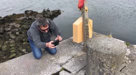 Man filming with mobile phone