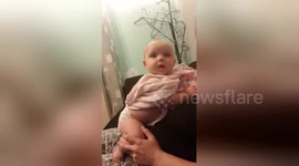 Adorable baby has priceless reaction when startled by a pig grunting sound